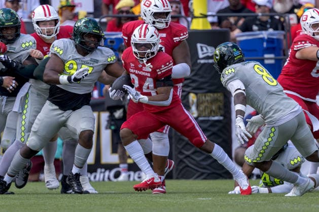 June 13, 2026, Washington, D.C, U.S: DC Defenders running back Xazavian Valladay (24) carries the ball during the United Bowl UFL Championship game at Audi Field, Washington, D.C. UFL 2026 - United Bowl -Kings 27:20 Defenders  - ZUMAs304 20260613_zaf_s304_023 Copyright: xScottxStuartx