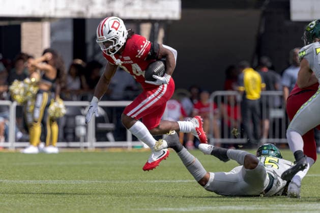 June 13, 2026, Washington, D.C, U.S: DC Defenders running back Xazavian Valladay (24) hops over a tackle during the United Bowl UFL Championship game at Audi Field, Washington, D.C. UFL 2026 - United Bowl -Kings 27:20 Defenders  - ZUMAs304 20260613_zaf_s304_026 Copyright: xScottxStuartx