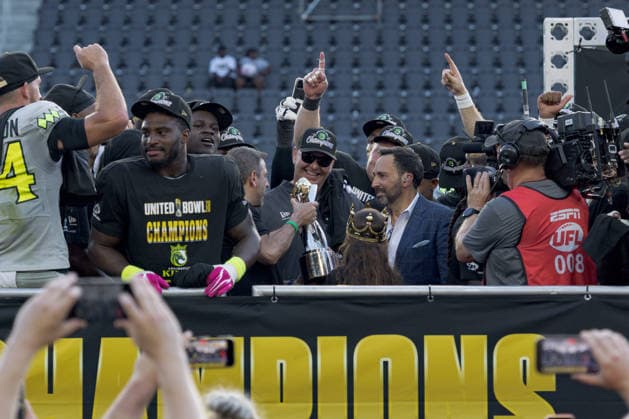 June 13, 2026, Washington, D.C, U.S: Louisville Kings head coach Chis Redmond (center) takes the trophy for winning the United Bowl UFL Championship game at Audi Field, Washington, D.C. Washington U.S - ZUMAs304 20260613_zaf_s304_001 Copyright: xScottxStuartx