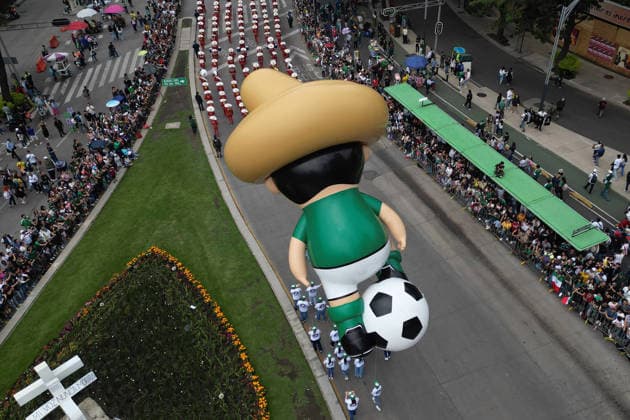 World Cup parade held in Mexico City MEXICO CITY, MEXICO - JUNE 13: A giant football themed inflatable figure moves along the route during a World Cup parade, in Mexico City, Mexico on June 13, 2026. Thousands of participants, including dancers, football-themed floats and giant inflatable figures, took part in the World Cup parade as part of the cultural activities organized by the Mexico City government during the World Cup. Daniel Cardenas Anadolu Mexico City Mexico. Editorial use only. Please get in touch for any other usage.  Copyright: x2026xAnadoluxDanielxCardenasx
