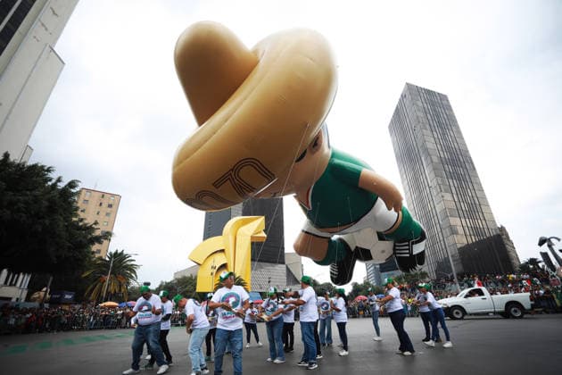 World Cup parade held in Mexico City MEXICO CITY, MEXICO - JUNE 13: A giant football themed inflatable figure moves along the route during a World Cup parade, in Mexico City, Mexico on June 13, 2026. Thousands of participants, including dancers, football-themed floats and giant inflatable figures, took part in the World Cup parade as part of the cultural activities organized by the Mexico City government during the World Cup. Daniel Cardenas Anadolu Mexico City Mexico. Editorial use only. Please get in touch for any other usage.  Copyright: x2026xAnadoluxDanielxCardenasx