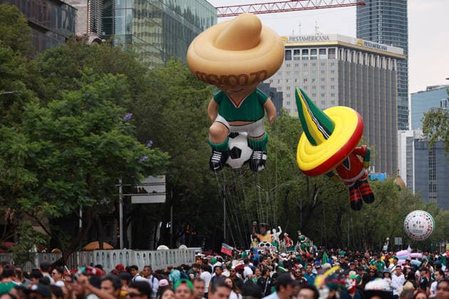 World Cup parade held in Mexico City MEXICO CITY, MEXICO - JUNE 13: A giant football themed inflatable figure moves along the route during a World Cup parade, in Mexico City, Mexico on June 13, 2026. Thousands of participants, including dancers, football-themed floats and giant inflatable figures, took part in the World Cup parade as part of the cultural activities organized by the Mexico City government during the World Cup. Daniel Cardenas Anadolu Mexico City Mexico. Editorial use only. Please get in touch for any other usage.  Copyright: x2026xAnadoluxDanielxCardenasx