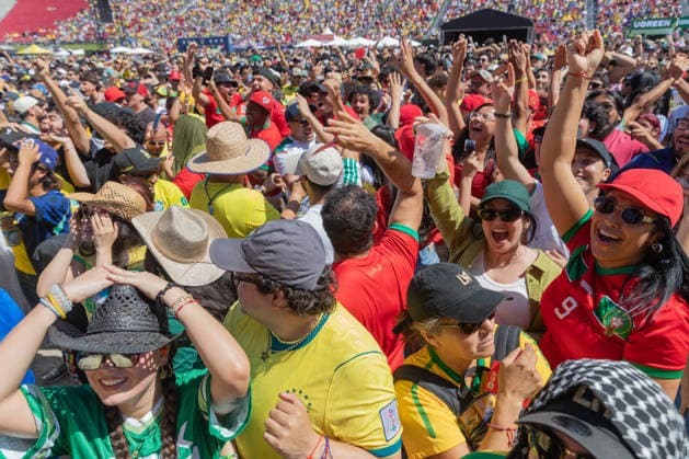Fans watch Brazil v Morocco - FIFA World Cup, WM, Weltmeisterschaft, Fussball 2026 match in Los Angeles LOS ANGELES, CALIFORNIA - JUNE 13: Supporters watch a live broadcast of FIFA World Cup First Stage Group C opening match between Brazil and Morocco during the Fan Festival at the Los Angeles Memorial Coliseum in Los Angeles, California on June 13, 2026. Grace Hie Yoon Anadolu California United States. Editorial use only. Please get in touch for any other usage.  Copyright: x2026xAnadoluxGracexHiexYoonx