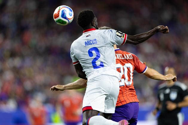 June 13, 2026; Foxborough, Massachusetts, USA; Haiti defender Calens Arcus (2) rises for the header against Scotland forward Lawrence Shankland (20) in a FIFA World Cup, WM, Weltmeisterschaft, Fussball 2026 Group C match between Haiti and Scotland at Boston Stadium. (c) CSM FIFA World Cup 2026: Haiti Vs Scotland JUN 13  - ZUMAc04_ 20260613_zma_c04_147 Copyright: xBurtxGranofskyx
