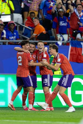 June 13, 2026; Foxborough, Massachusetts, USA; Scotland midfielder Lewis Ferguson (19), Scotland defender Aaron Hickey (2), and Scotland defender Jack Hendry (13) surround Scotland midfielder John McGinn (7) after a goal in a FIFA World Cup, WM, Weltmeisterschaft, Fussball 2026 Group C match between Haiti and Scotland at Boston Stadium. (c) CSM FIFA World Cup 2026: Haiti Vs Scotland JUN 13  - ZUMAc04_ 20260613_zma_c04_152 Copyright: xBurtxGranofskyx