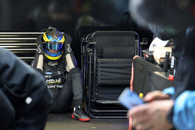 Sebastian Bourdias FRA Cadillac V Series R 12 sits with helmet on disappointed on the ground after a stop due to a technical defect in the pits, 24 Hours of Le Mans, France, WEC World Endurance Championship, 14 06 2026, problem with the leading race car until then