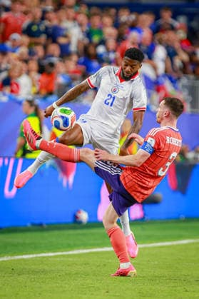 June 14, 2026, Foxborough, Massachusetts, USA: JOSUE CASIMIR of Haiti and ANDY ROBERTSON (CAPTAIN) of Scotland challeneg for the ball during the 2026 FIFA World Cup, WM, Weltmeisterschaft, Fussball Group C match at Boston Stadium in Massachusetts on June 12, 2026. Haiti 0 V 1 Scotland - FIFA World Cup 2026  - ZUMAm283 20260614_zsp_m283_005 Copyright: xBillyxMyersx