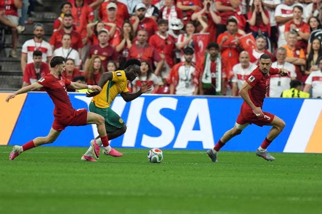 Australia v Turkiye - FIFA World Cup, WM, Weltmeisterschaft, Fussball 2026 - Group D VANCOUVER, CANADA - JUNE 13: Ismail Yuksek (L) of Turkiye in action against aNestory Irankunda (2nd L) of Australia during the 2026 FIFA World Cup First Stage Group D match between Australia and Turkiye at BC Place Stadium in Vancouver, Canada on June 13, 2026. Ercin Erturk Anadolu British Columbia Canada. Editorial use only. Please get in touch for any other usage.  Copyright: x2026xAnadoluxErcinxErturkx