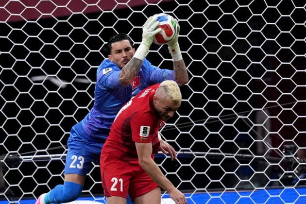 June 13, 2026, Vancouver, Bc, CANADA: Turkey s Ugurcan Cakir (23) stops the ball over top of teammate Baris Alper Yilmaz (21) during first half group D World Cup soccer action against Australia, in Vancouver, Saturday, June 13, 2026. AUSTRALIA V. TURKEY  - ZUMAc35_ 20260613_zaf_c35_183 Copyright: xEthanxCairnsx