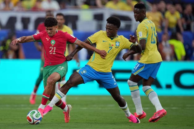 IPA85666459 - Vinicius Junior of Brazil in action against Ayoube Amaimouni-Echghouyab of Morocco during the Brazil vs. Morocco FIFA World Cup, WM, Weltmeisterschaft, Fussball match in New York, USA, on June 13, 2026  Copyright: xEmmanuelexMastrodonato IPAxSportx xx 85666459