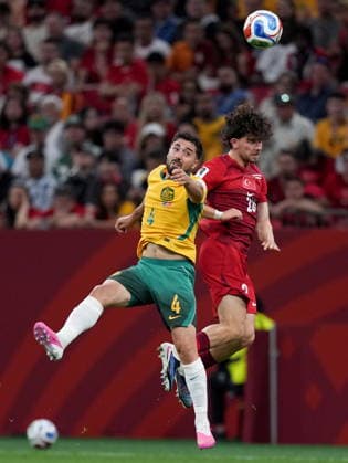 June 13, 2026, Vancouver, Bc, CANADA: Turkey s Ferdi Kadioglu (20) gets the header over Australia s Jacob Italiano (4) during first half group D World Cup soccer action, in Vancouver, Saturday, June 13, 2026. AUSTRALIA V. TURKEY  - ZUMAc35_ 20260613_zaf_c35_195 Copyright: xEthanxCairnsx