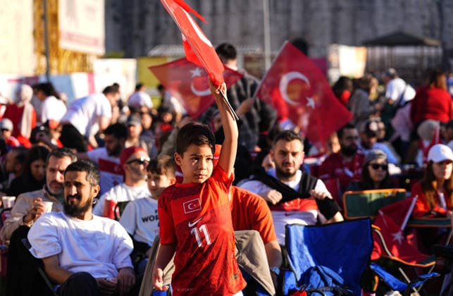 Turkish football fans gather to watch Turkiye-Australia World Cup match ISTANBUL, TURKIYE - JUNE 14: Turkish football fans holding Turkish flags gather at the historic Yedikule Fortress in Istanbul, Turkiye on June 14, 2026, to watch the live broadcast of the Turkish National Football Team s opening match against Australia in Group D of the 2026 FIFA World Cup, WM, Weltmeisterschaft, Fussball Esra Bilgin Anadolu Istanbul Turkey. Editorial use only. Please get in touch for any other usage.  Copyright: x2026xAnadoluxEsraxBilginx