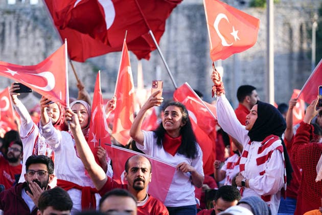 Turkish football fans gather to watch Turkiye-Australia World Cup match ISTANBUL, TURKIYE - JUNE 14: Turkish football fans holding Turkish flags gather at the historic Yedikule Fortress in Istanbul, Turkiye on June 14, 2026, to watch the live broadcast of the Turkish National Football Team s opening match against Australia in Group D of the 2026 FIFA World Cup, WM, Weltmeisterschaft, Fussball Esra Bilgin Anadolu Istanbul Turkey. Editorial use only. Please get in touch for any other usage.  Copyright: x2026xAnadoluxEsraxBilginx
