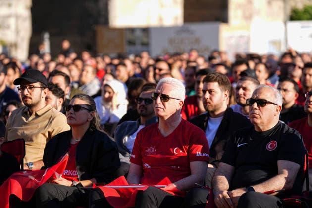 Turkish football fans gather to watch Turkiye-Australia World Cup match ISTANBUL, TURKIYE - JUNE 14: Turkish football fans gather at the historic Yedikule Fortress in Istanbul, Turkiye on June 14, 2026, to watch the live broadcast of the Turkish National Football Team s opening match against Australia in Group D of the 2026 FIFA World Cup, WM, Weltmeisterschaft, Fussball Istanbul Governor Davut Gul (C) is also present and watches the match. Esra Bilgin Anadolu Istanbul Turkey. Editorial use only. Please get in touch for any other usage.  Copyright: x2026xAnadoluxEsraxBilginx
