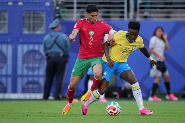 SOCCER - FIFA World Cup, WM, Weltmeisterschaft, Fussball - Group E - Ivory Coast vs. Ecuador Photo by IPA ABACAPRESS.COM85666298 - Brazil s Vinicius Junior in action against Morocco s Achraf Hakimi during the Group E match between Ivory Coast and Ecuador at the FIFA World Cup in Philadelphia, USA, on June 14, 2026 Philadelphia  Copyright: xIPAxSport ABACAx