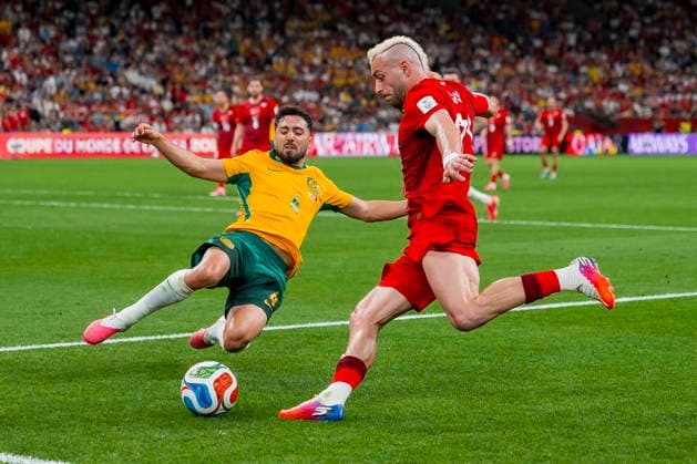FIFA World Cup, WM, Weltmeisterschaft, Fussball 2026 - Group D - Australia vs Turkey Jacob Italiano of Australia (L) and Baris Alper Yilmaz (R) of Turkey in action during the first half of the FIFA World Cup 2026 group stage match between Australia and Turkey, Vancouver, Canada, 13 June 2026. VANCOUVER Canada  Copyright: xBOBxFRIDx