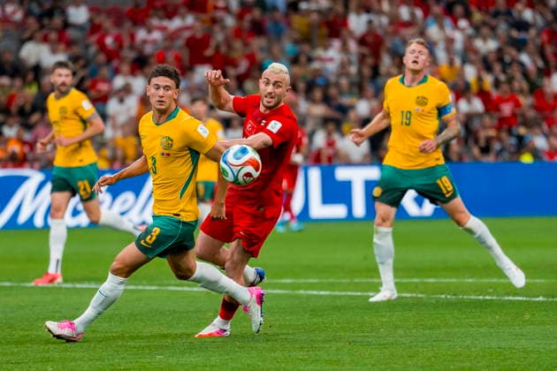 FIFA World Cup, WM, Weltmeisterschaft, Fussball 2026 - Group D - Australia vs Turkey Alessandro Circati (L) of Australia and Baris Alper Yilmaz (C) of Turkey in action during the first half of the FIFA World Cup 2026 group stage match between Australia and Turkey, Vancouver, Canada, 13 June 2026. VANCOUVER Canada  Copyright: xBOBxFRIDx