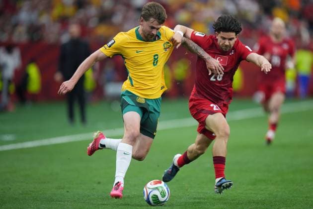 June 13, 2026, Vancouver, Bc, CANADA: Australia s Conor Metcalfe (8) and Turkey s Ferdi Kadioglu (20) vie for the ball during the first half of a World Cup Group D soccer match, in Vancouver, on Saturday, June 13, 2026. Canada News - June 13, 2026  - ZUMAc35_ 20260613_zaf_c35_203 Copyright: xDarrylxDyckx
