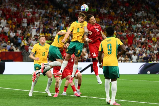 Connor Metcalfe of Australia contests a header with Abulkerim Bardakci of Turkiye during the FIFA World Cup, WM, Weltmeisterschaft, Fussball 2026 match between Australia and Turkey at BC Place, Vancouver, Canada on 13 June 2026. Copyright: xPeterxDovganx 45060021