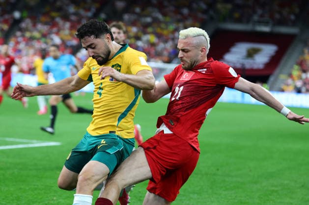 Baris Yilmaz of Turkiye is challenged by Jacob Italiano of Australia during the FIFA World Cup, WM, Weltmeisterschaft, Fussball 2026 match between Australia and Turkey at BC Place, Vancouver, Canada on 13 June 2026. Copyright: xPeterxDovganx 45060040