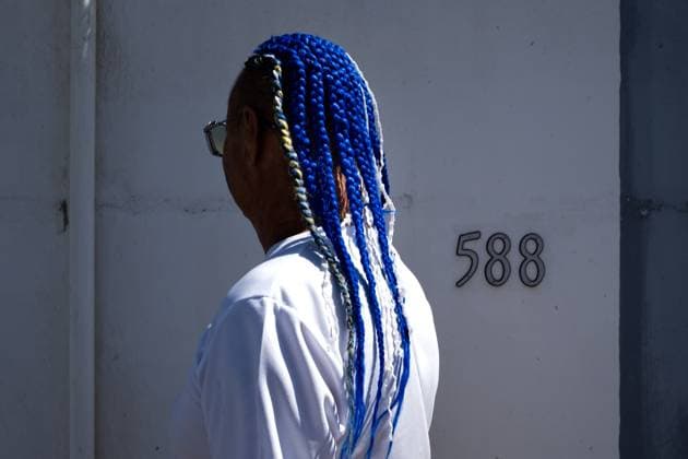 WILLEMSTAD - A man with dreadlocks has dyed his hair the colors of Curacao. For Curacao, the football World Cup begins with a match against Germany. RAMON VAN FLYMEN ANP netherlands out - belgium out Willemstad xVIxxIVx 560949879 originalFilename: 0859065924st.jpg