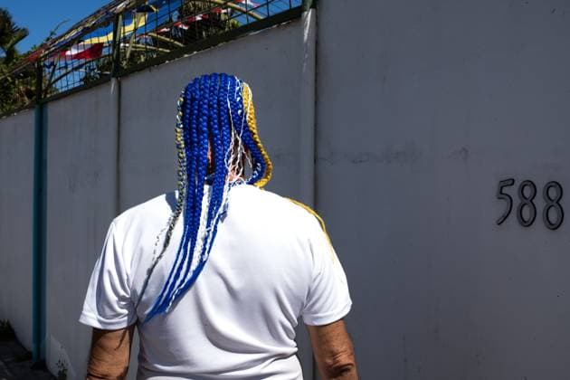 WILLEMSTAD - A man with dreadlocks has dyed his hair the colors of Curacao. For Curacao, the football World Cup begins with a match against Germany. RAMON VAN FLYMEN ANP netherlands out - belgium out Willemstad xVIxxIVx 560949891 originalFilename: 0859066157st.jpg