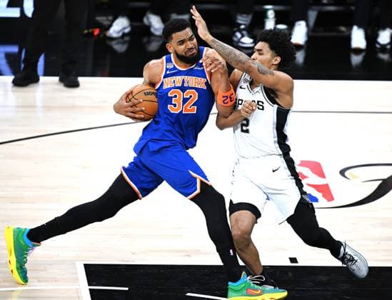 (260614) -- SAN ANTONIO, June 14, 2026 -- Karl-Anthony Towns (L) of New York Knicks vies with Dylan Harper of San Antonio Spurs during the final game 5 between New York Knicks and San Antonio Spurs at the 2025-2026 NBA, Basketball Herren, USA basketball game in San Antonio, the United States, June 13, 2026. ) (SP)U.S.-SAN ANTONIO-BASKETBALL-NBA-FINALS-KNICKS VS SPURS WuxXiaoling 