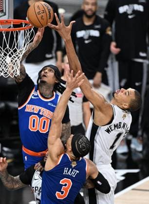 (260614) -- SAN ANTONIO, June 14, 2026 -- Victor Wembanyama (R) of San Antonio Spurs competes during the final game 5 between New York Knicks and San Antonio Spurs at the 2025-2026 NBA, Basketball Herren, USA basketball game in San Antonio, the United States, June 13, 2026. ) (SP)U.S.-SAN ANTONIO-BASKETBALL-NBA-FINALS-KNICKS VS SPURS WuxXiaoling 