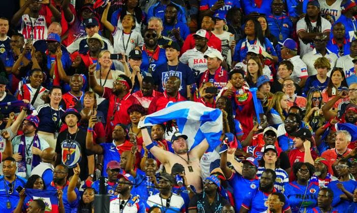 A Scotland supporter surrounded by Haiti fans Haiti v Scotland, 2026 FIFA World Cup, WM, Weltmeisterschaft, Fussball Group C, Football, Boston Stadium, Foxborough, Massachusetts, USA - 13 Jun 2026Foxborough Boston Stadium Massachusetts (MA) United States of America EDITORIAL USE ONLY No use with unauthorised audio, video, data, fixture lists, club league logos or live services. Online in-match use limited to 120 images, no video emulation. No use in betting, games or single club league player publications.  Copyright: xJavierxGarcia Shutterstockx 16924166fi