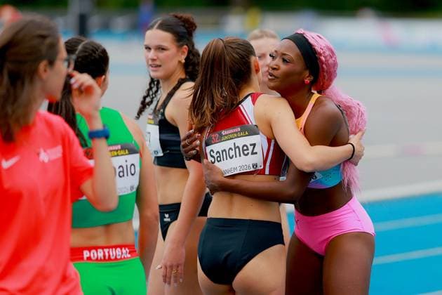 Sereina Liem Switzerland and Ndasi Daryl Munich Athletics embrace after the competition on the tartan track of the Michael Hoffmann Stadium at the 32 Bauhaus Junior Gala Mannheim Other athletes, including a Portuguese woman, can be seen in the background Sereina Liem and Ndasi Daryl embrace at the 32 Junior Gala Mannheim Copyright: xspeedshotx