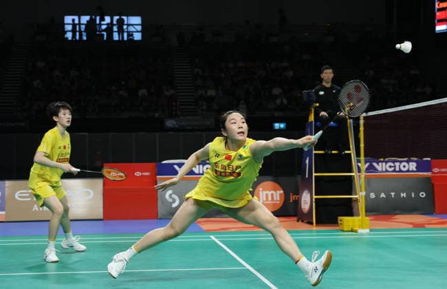 (SP)AUSTRALIA-SYDNEY-BADMINTON-AUSTRALIAN OPEN-WOMEN S DOUBLES (260614) -- SYDNEY, June 14, 2026 (Xinhua) -- Jia Yifan (R) Zhang Shuxian compete during the women s doubles final match between Jia Yifan Zhang Shuxian of China and Febriana Dwipuji Kusuma Meilysa Trias Puspitasari of Indonesia at the Australian Badminton Open 2026 in Sydney, Australia, June 14, 2026. (Xinhua Gong Bing)