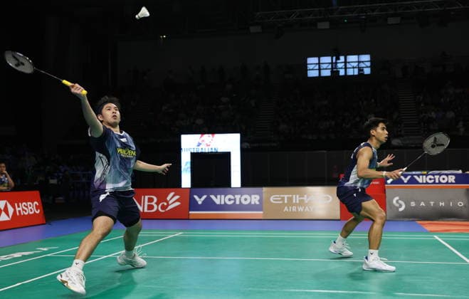 (260614) -- SYDNEY, June 14, 2026 -- Sabar Karyaman Gutama Moh Reza Pahlevi Isfahani (L) compete during the men s doubles final between Chen Boyang Liu Yi of China and Sabar Karyaman Gutama Moh Reza Pahlevi Isfahani of Indonesia at the Australian Badminton Open 2026 in Sydney, Australia, June 14, 2026. ) (SP)AUSTRALIA-SYDNEY-BADMINTON-AUSTRALIAN OPEN-MEN S DOUBLES GongxBing 