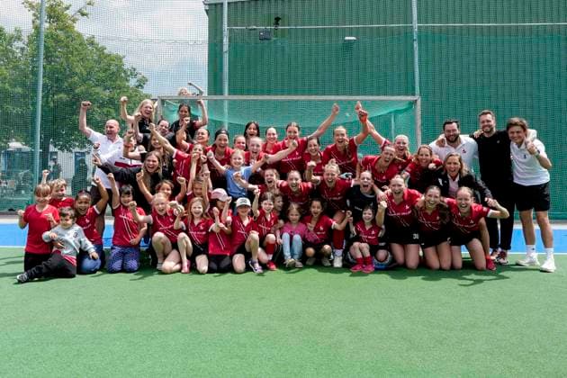 Players of TSV Mannheim Hockey, cheering after the final whistle about the promotion to the 1 Bundesliga, promoted, promoted women, promoted, joy about the victory, winner, winner, cheers, cheering, cheerful, positive, rejoicing, optimistic, highlight, action, action, team photo, team, team, group picture, 14 06 2026, Mannheim Germany , Hockey, 2 Bundesliga Group South, Women, Feudenheimer HC TSV Mannheim xozx