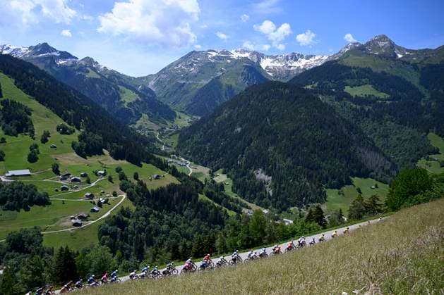 Tour Auvergne - Rhone-Alpes 2026 Stage 8 PLATEAU DE SOLAISON - BRISON, FRANCE - JUNE 14 : illustration picture peloton during stage 8 of the 78th edition of Tour Auvergne - Rhone-Alpes an UCI World Tour 2.UWT cycling road race stage for Men Elite of 120.1 km with start in Beaufort and finish in Plateau de Solaison - Brison on June 14, 2026 in Plateau de Solaison - Brison, France, 14 06 2026 ( Motordriver Guy De Vuyst - Plateau de Solaison - Brison France  Copyright: xVincentxKalutx