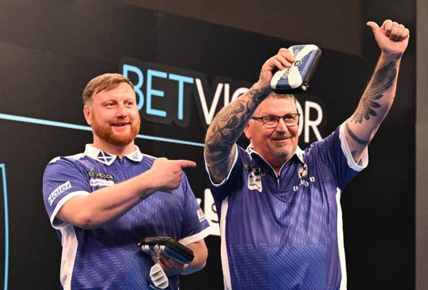 14 06 2026, xhbx, Dart World Cup of Darts 2026, v l Cameron Menzies Scotland , Gary Anderson Scotland cheering after the end of the match DFL DFB REGULATIONS PROHIBIT ANY USE OF PHOTOGRAPHS as IMAGE SEQUENCES and or QUASI VIDEO Frankfurt