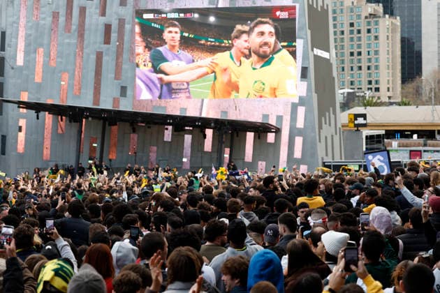 WORLD CUP LIVE SITE, Fans celebrate the Socceroos 2nd goal scored while watching the FIFA World Cup, WM, Weltmeisterschaft, Fussball Group D Australia versus TuÌˆrkiye match live site at Federation Square in Melbourne, Sunday, June 14, 2026. ( NO ARCHIVING Melbourne Victoria Australia  Copyright: xConxChronisx 20260614160937818685
