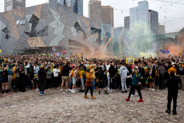 WORLD CUP LIVE SITE, Fans celebrate the Socceroos first goal scored while watching the FIFA World Cup, WM, Weltmeisterschaft, Fussball Group D Australia versus TuÌˆrkiye match live site at Federation Square in Melbourne, Sunday, June 14, 2026. ( NO ARCHIVING Melbourne Victoria Australia  Copyright: xConxChronisx 20260614187579929854
