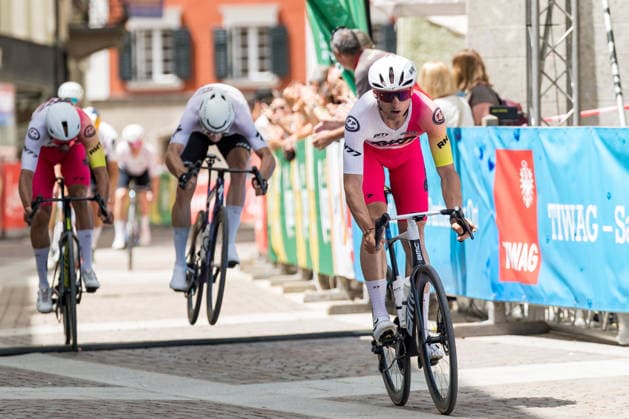 Crossing the finish line, from left Johnny HOOGERLAND NED, 3rd place , Jan KATTANEK AUT, 2nd place , winner of the Tour of the Dolomites Maximilian KUEN AUT Photo Eibner Pressefoto Groder Lienz  EP_gro