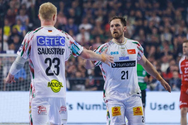 Albin LAGERGREN SC Magdeburg, 21 jubilation, joy, passion, success, emotion, enthusiasm, positive emotions with Magnus SAUGSTRUP SC Magdeburg, 23 GER, Aalborg Handbold vs SC Magdeburg, handball, TruckScout24 EHF FINAL4 2026, Match for 3rd place, 2025 2026 season, 14 06 2026,, GER, Aalborg Handbold vs SC Magdeburg, Handball, TruckScout24 EHF FINAL4 2026, Match for 3rd place, 2025 2026 season, 14 06 2026, Cologne Copyright: xEibnerxPressefoto OliverxSchmidtx EP_OST