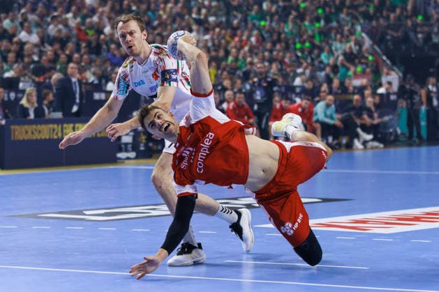 Mads HOXER Aalborg Handbold, 14 scores a goal, Action, Goal throw GER, Aalborg Handbold vs SC Magdeburg, Handball, TruckScout24 EHF FINAL4 2026, Match for 3rd place, Match time 2025 2026, 14 06 2026,, GER, Aalborg Handbold vs SC Magdeburg, Handball, TruckScout24 EHF FINAL4 2026, Match for 3rd place, Match time 2025 2026, 14 06 2026, Koeln Copyright: xEibnerxPressefoto OliverxSchmidtx EP_OST