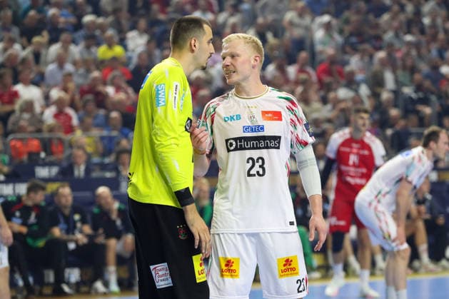 14 06 2026, xgox, Handball EHF Champions League match for 3rd place SC Magdeburg Aalborg Handbold v l Matej Mandic Magdeburg, 12 , Magnus Saugstrup Magdeburg, 23 gives instructions, gestures with his arms, gesticulates, gives instructions Köln