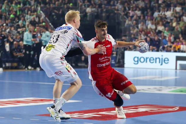 Cologne 14.06.2026. Pilka reczna EHF Liga Mistrzow sezon 2025 26 final4 mecz: Aalborg Handbold - SC Magdeburg --- Handball EHF Champions League season 2025 26 final4 match: Aalborg Handbold - SC Magdeburg nz Saugstrup Magnus, Hoxer Mads Fot. Kacper Staniec NEWSPIX.PL --- newspix.pl 