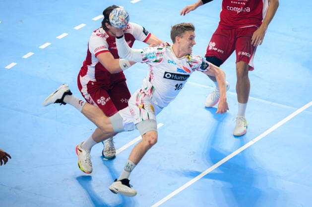 Cologne, Germany Handball EHF CL Final 4 Match 3rd place Aalborg Handbold SC Magdeburg from left in duel Vetle Ronningen Aalborg , Gisli Thorgeir Kristjansson SC Magdeburg Cologne Lanxess Arena Nordrhein Westfalen Germany