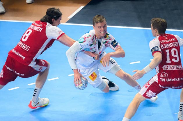 Cologne, Germany Handball EHF CL Final 4 Match 3rd place Aalborg Handbold SC Magdeburg from left in duel Vetle Ronningen Aalborg , Gisli Thorgeir Kristjansson SC Magdeburg Cologne Lanxess Arena Nordrhein Westfalen Germany
