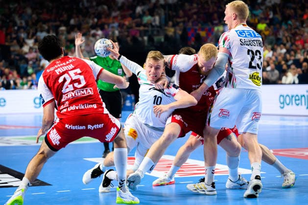 Cologne, Germany Handball EHF CL Final 4 Match 3rd place Aalborg Handbold SC Magdeburg from left Marinus Grandahl Munk Aalborg , Gisli Thorgeir Kristjansson SC Magdeburg , Thomas Arnoldsen Aalborg , Magnus Saugstrup Jensen SC Magdeburg Cologne Lanxess Arena Nordrhein Westfalen Germany
