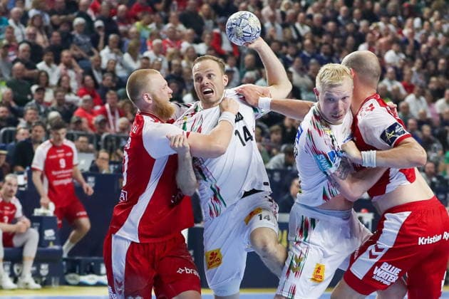 Cologne 14.06.2026. Pilka reczna EHF Liga Mistrzow sezon 2025 26 final4 mecz: Aalborg Handbold - SC Magdeburg --- Handball EHF Champions League season 2025 26 final4 match: Aalborg Handbold - SC Magdeburg nz Magnusson Omar Ingi, Saugstrup Magnus Fot. Kacper Staniec NEWSPIX.PL --- newspix.pl 