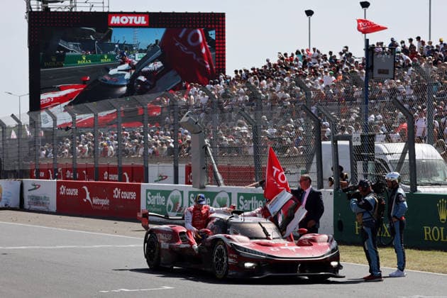 Winner Mike Conway GBR Kamui Kobayashi JPN Nyck de Vries NED Toyota GR010 Hybrid 7 during the lap of honor on the start-finish straight, Race, 24 Hours of Le Mans, France, WEC World Endurance Championship, 14 06 2026, Toyota Gazoo Racing