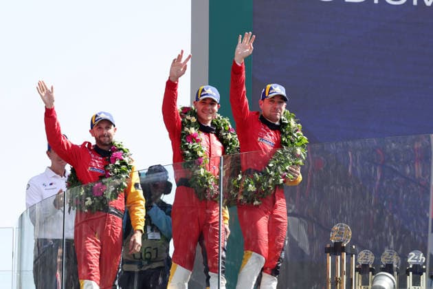 Overall runner-up Rene Rast GER Sheldon van der Linde RSA Robin Frijns NED BMW M Hybrid V8 20 on the podium, Race, 24 Hours of Le Mans, France, WEC World Endurance Championship, 14 06 2026, podium ceremony