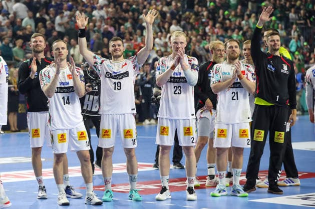 14 06 2026, xgox, Handball EHF Champions League match for 3rd place SC Magdeburg Aalborg Handbold v l Omar Ingi Magnusson Magdeburg, 14 , Elvar Oern Jonsson Magdeburg, 19 , Magnus Saugstrup Magdeburg, 23 , Albin Lagergren Magdeburg, 21 Celebrating the victory, cheering after the end of the match Cologne
