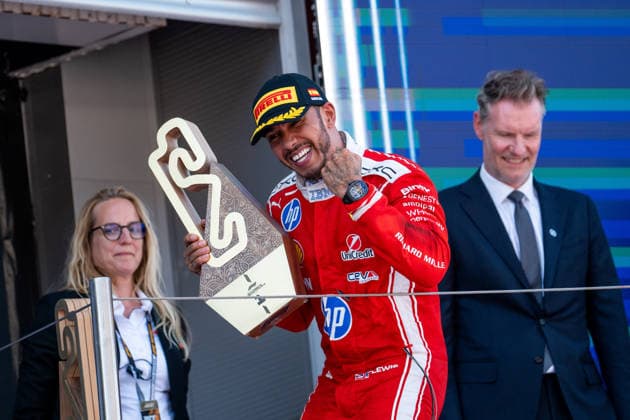 ESP, MSC Cruises Grand Prix of Barcelona Catalunya, Race, Formula 1 World Championship Season 2026 14 06 2026, Circuit de Barcelona Catalunya, Barcelona, ESP, MSC Cruises Grand Prix of Barcelona Catalunya, Race, Formula 1 World Championship Season 2026, in the picture Lewis Hamilton Scuderia Ferrari HP, Great Britain, 44 celebrates his first victory with Ferrari on the podium at the award ceremony with trophy, nordphotoxGmbHx xMemmler nph00005